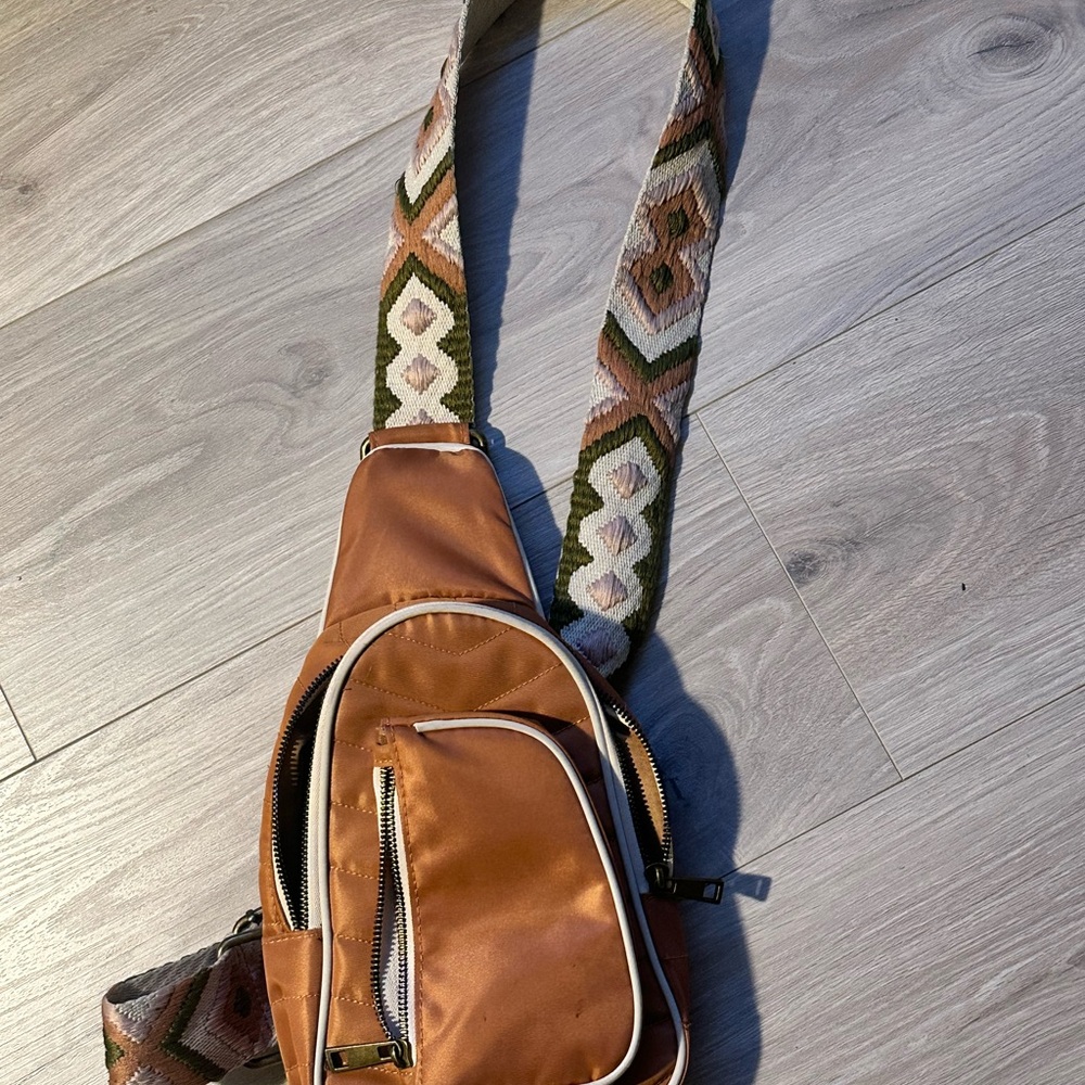 Stylish Brown Crossbody Bag with Patterned Strap